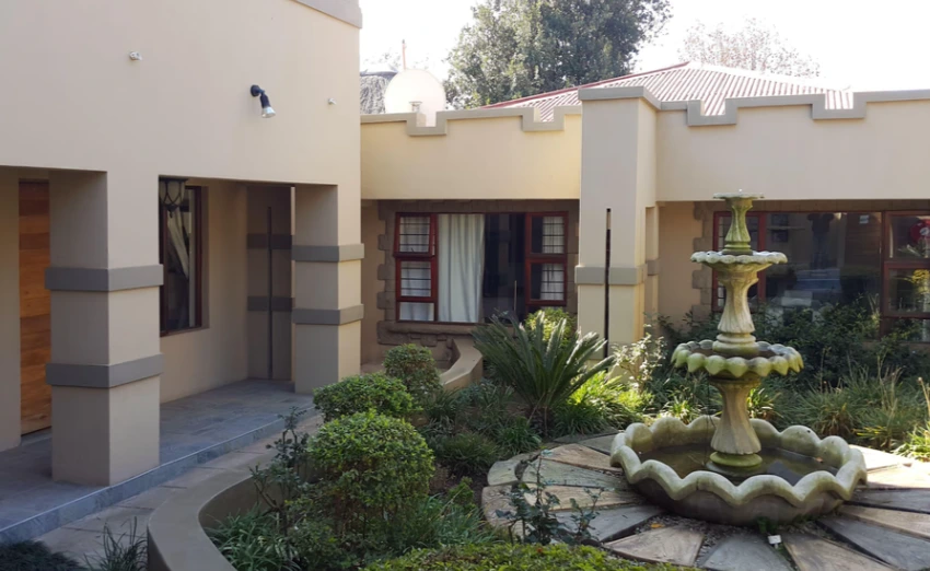 Garden-facing accommodation suite at L'Arche De La Vie Estate